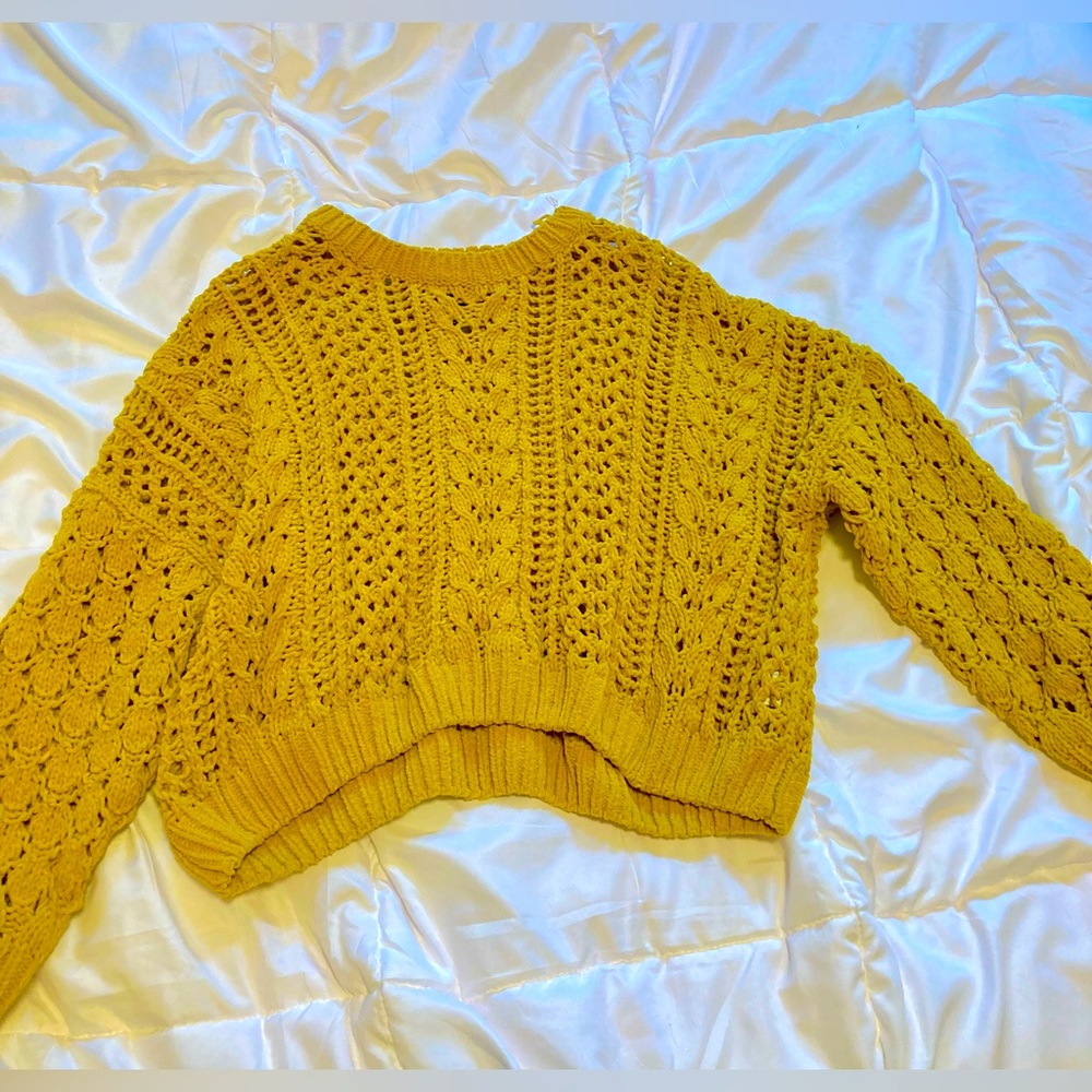 Yellow knitted sweater